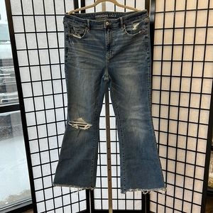 Distressed flared jean